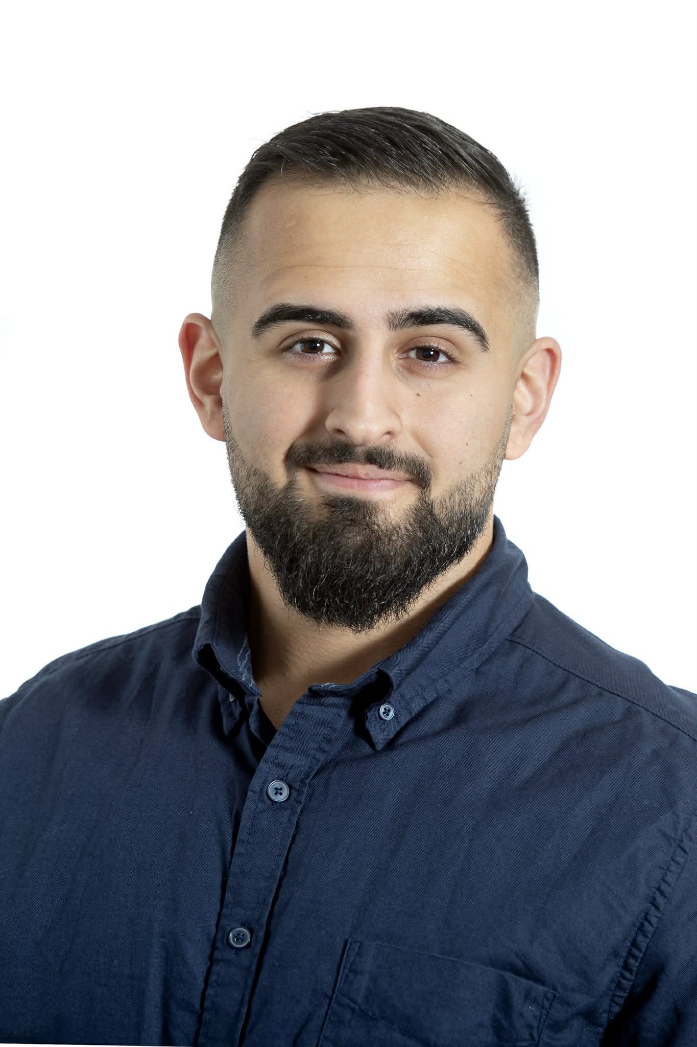 Porträtt av Ali Mansoor